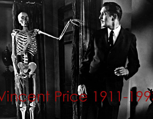 A black and white photo of a man in a suit and a skeleton.