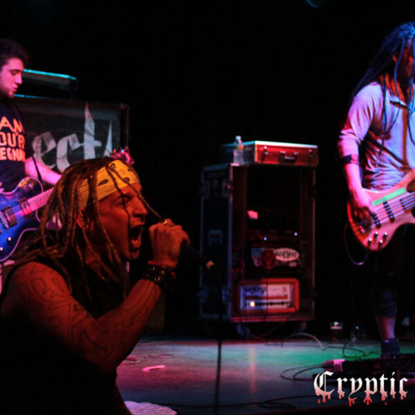 A group of people playing music on stage.