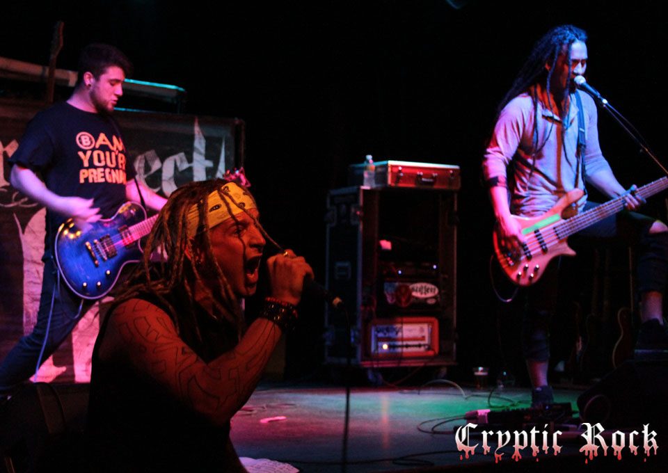 A group of people playing music on stage.