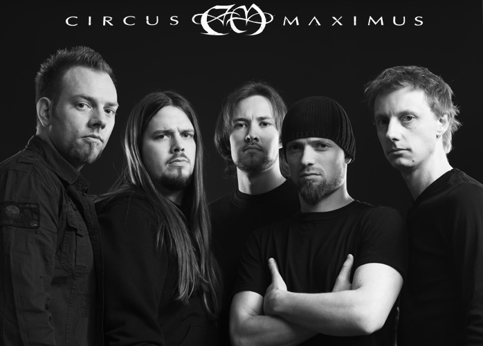 A group of men standing in front of a black background with the words circus maximus.