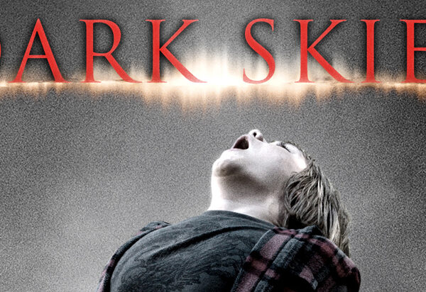 The cover of dark skies.