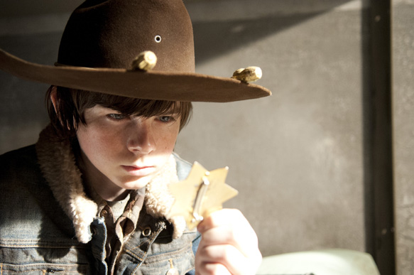 Carl Grimes (Chandler Riggs) - The Walking Dead_Season 3, Episode 16_"Welcome to the Tombs" - Photo Credit: Gene Page/AMC