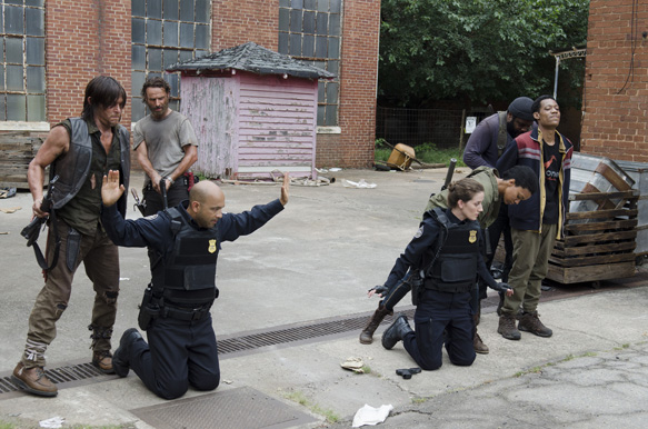 Norman Reedus as Daryl Dixon, Andrew Lincoln as Rick Grimes, Maximiliano Hernandez as Lamson, Teri Wyble as Shepherd, Chad Coleman as Tyreese and Tyler James Williams as Noah - The Walking Dead _ Season 5, Episode 7 - Photo Credit: Gene Page/AMC