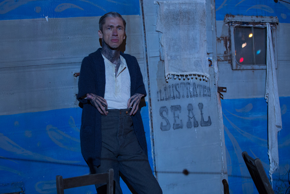 AMERICAN HORROR STORY: FREAK SHOW "Tupperware Party Massacre"- Episode 409 (Airs Wednesday, December 10, 10:00 PM e/p) --Pictured: Mat Fraser as Paul the Illustrated Seal. CR: Sam Lothridge/FX