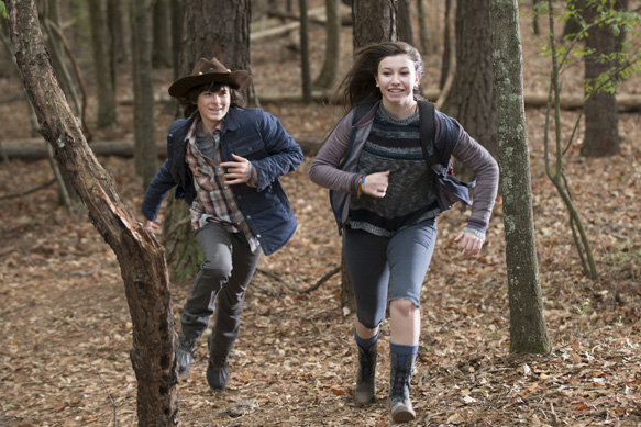 Chandler Riggs as Carl Grimes and Katelyn Nacon as Enid - The Walking Dead _ Season 5, Episode 15 - Photo Credit: Gene Page/AMC